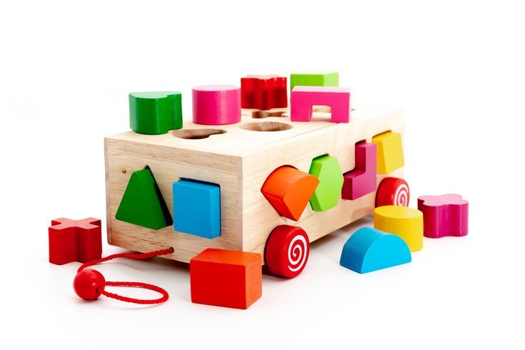 Assorted Montessori-style toys organised by toy type