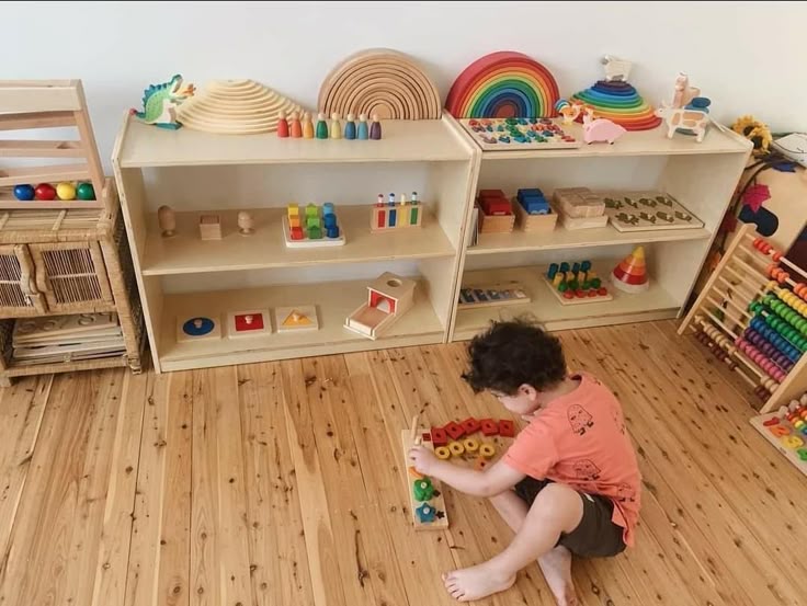 Montessori-style play space with low shelves and open floor space