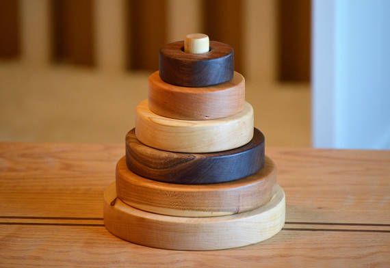 Wooden Montessori stacking rings on a central post